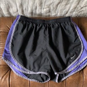 Gray and purple Nike shorts
